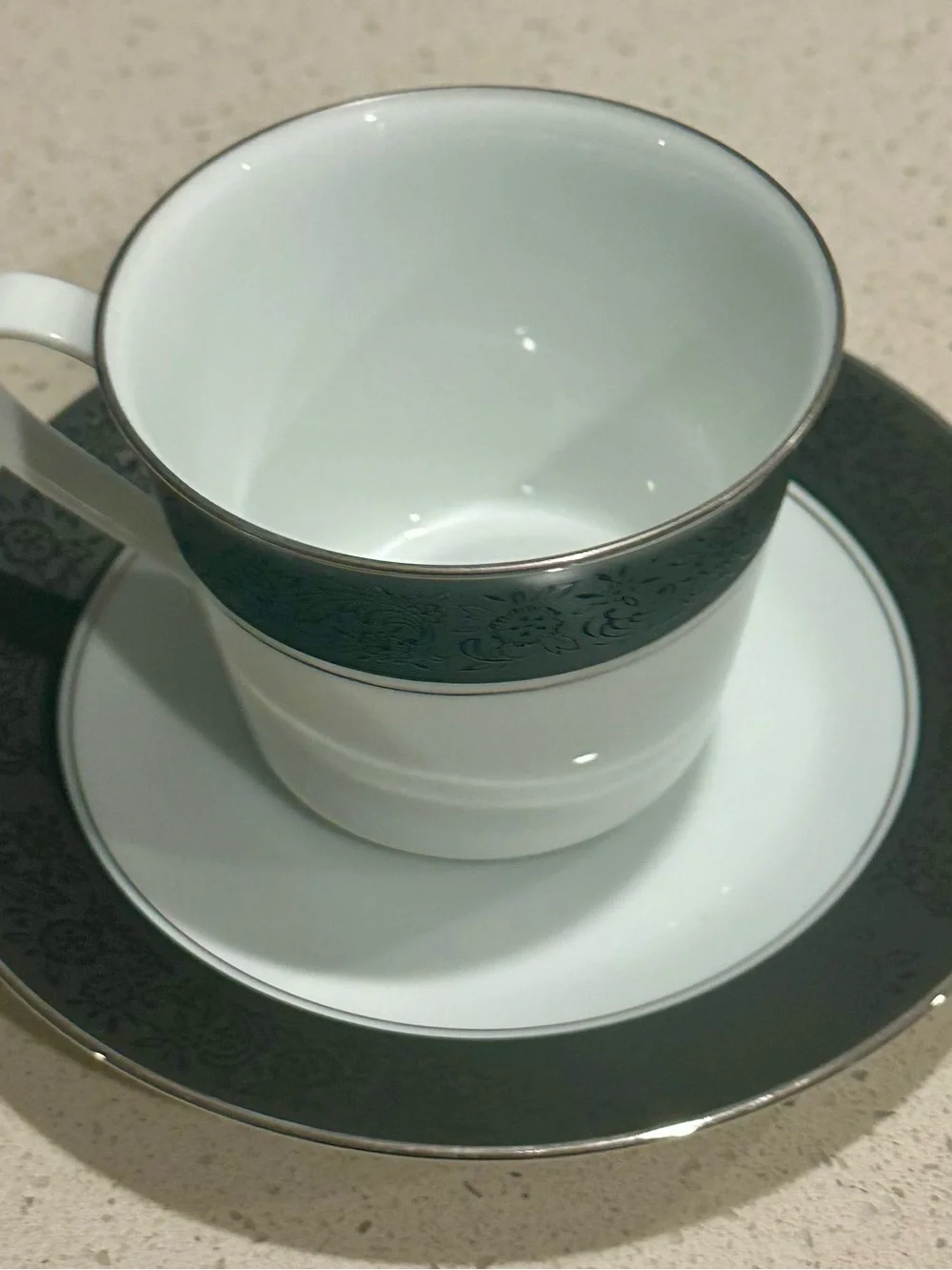 Noritake White Porcelain Teacup and Saucer Silver Trim